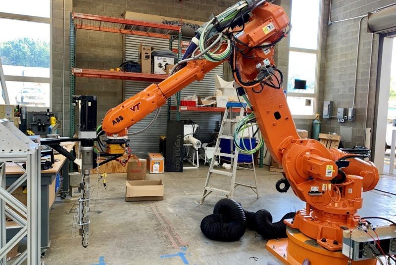 Large orange 3-d robot printer